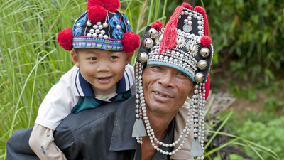 Familie des Bergvolkes Akha, Thailand Reisen